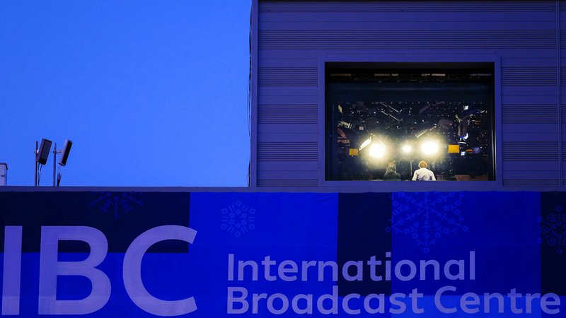 Television personnel work inside of the International Broadcast Center at the 2018 Winter Olympics in Pyeongchang, South Korea, Wednesday, Feb. 21, 2018. Live television has always presented challenges, but NBC's Olympic stumbles this month have unfolded before an audience ready to pounce.