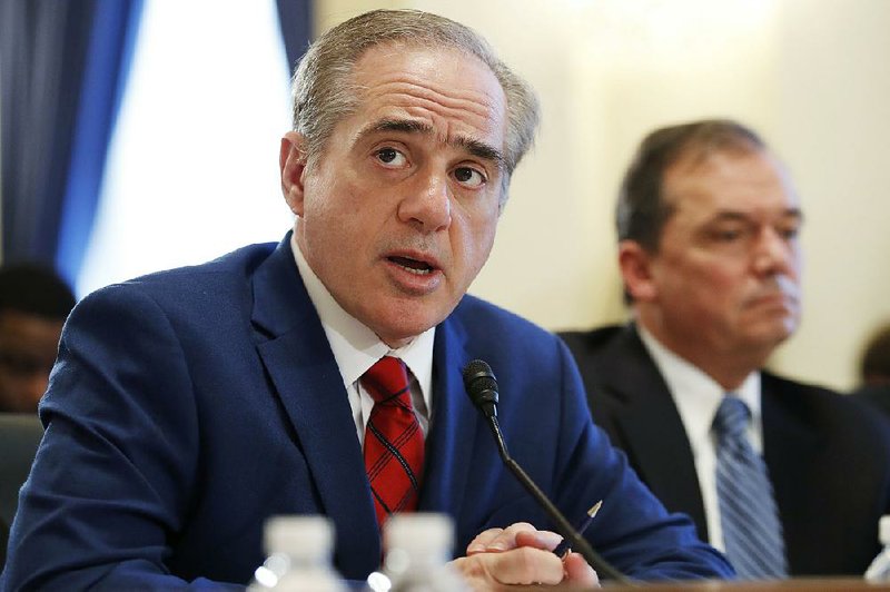 Veterans Affairs Secretary David Shulkin, left, next to James Manker, VA Acting Principal Deputy Under Secretary for Benefits, speaks about FY19 to the House Veterans Affairs Committee, Thursday, Feb. 15, 2018, on Capitol Hill in Washington.