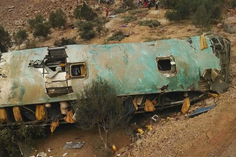 A bus rests at the bottom of a cliff in Arequipa, Peru, after it plunged from the roadway early Wednesday. 