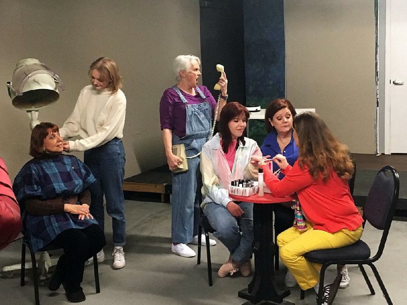 The cast of Steel Magnolias at the Lantern Theatre in Conway (from left): Wendy Miers (Clairee, seated), Dani Carney (Annelle), Lisa Ray (Ousier, holding phone) Darby Burden (Shelby), Wendy Shirar (M’Lynn) and Kelly Weber (Truvy).
