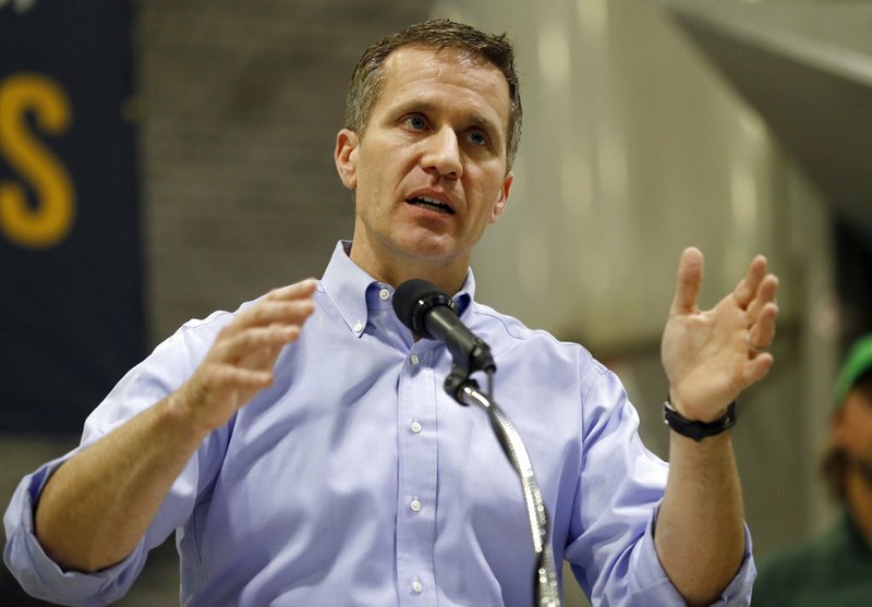 In this Jan. 29, 2018, file photo, Missouri Gov. Eric Greitens speaks in Palmyra, Mo. A St. Louis grand jury has indicted Greitens on a felony invasion of privacy charge related to the Republican's affair with a woman in 2015. St. Louis Circuit Attorney Kim Gardner announced the indictment Thursday, Feb. 22, 2018. She launched an investigation in January after Greitens admitted to an affair with his St. Louis hairdresser that began in March 2015. He was elected governor in November 2016. 