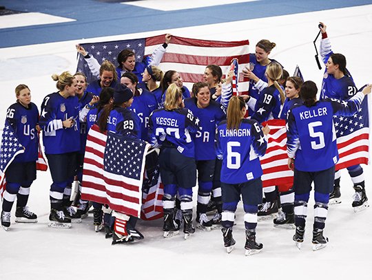 The Associated Press ICE GOLD: Members of the United States women's hockey team celebrate Thursday after defeating Canada, 3-2, in shootout in the gold medal game at the 2018 Winter Olympics in Gangneung, South Korea.