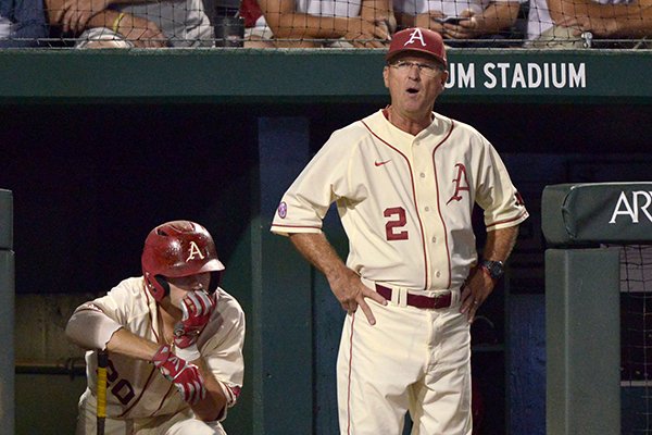 Carson Shaddy, Arkansas second baseman, and Dave Van Horn, Arkansas coach, watch as Arkansas trails Missouri State 3-2 in the 9th inning Monday, June 5, 2017, during the final game of the NCAA Fayetteville Regional at Baum Stadium in Fayetteville.