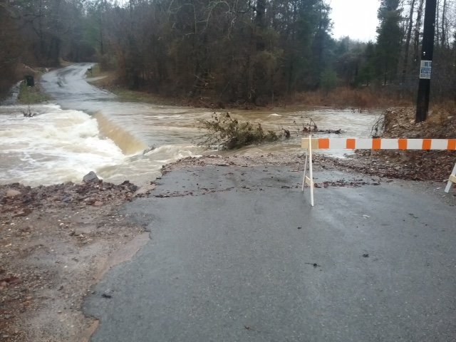 The county road department has closed the section of Speers Circle that crosses Big Blakely Creek, which has overflowed the roadway. Residents who live north of the creek will have to take the long way around to get back to Highway 298 in the Jessieville area, according to the county. Photo is courtesy of Bo Robertson, director of the Garland County Department of Emergency Management.