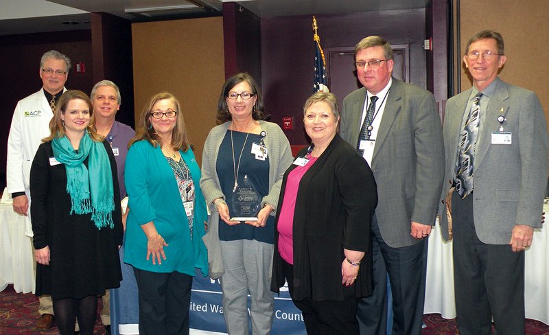 The United Way of White County recognized Unity Health with the Albert R. Yarnell Spirit Award at the Bonnie Schaff Victory Luncheon. Representing the hospital are, front row, from left, Natalie Horton, Unity Health Foundation specialist; Debbie Hare, director of quality, risk management and regulatory compliance; LaDonna Johnston, vice president of patient services and United Way campaign chairwoman; and Pam Williams, director of human resources. In the back row, from left, are Dr. Clark Fincher, internal-medicine physician; David Wilson, director of materials management; Phil Miller, chief information officer; and Ray Montgomery, president and chief executive officer.
