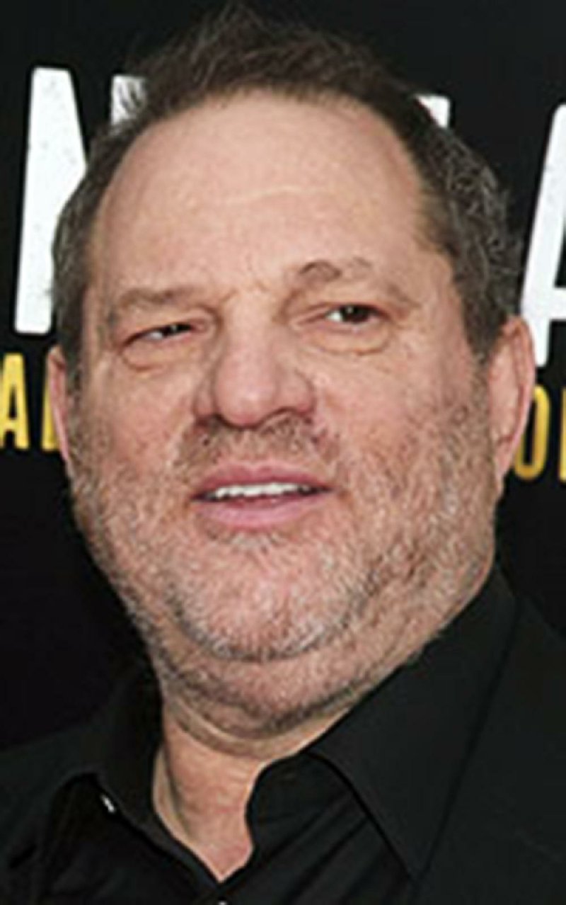 In this Nov. 25, 2013 file photo, producer Harvey Weinstein attends a screening of "Mandela: Long Walk To Freedom" in New York.  Los Angeles police said Thursday Oct. 19, 2017, that it is investigating a possible sexual assault case involving Harvey Weinstein that involves alleged conduct from 2013. The department released few details about the inquiry other than to say it has interviewed a potential victim and its inquiry is ongoing. (Photo by Andy Kropa/Invision/AP, File)