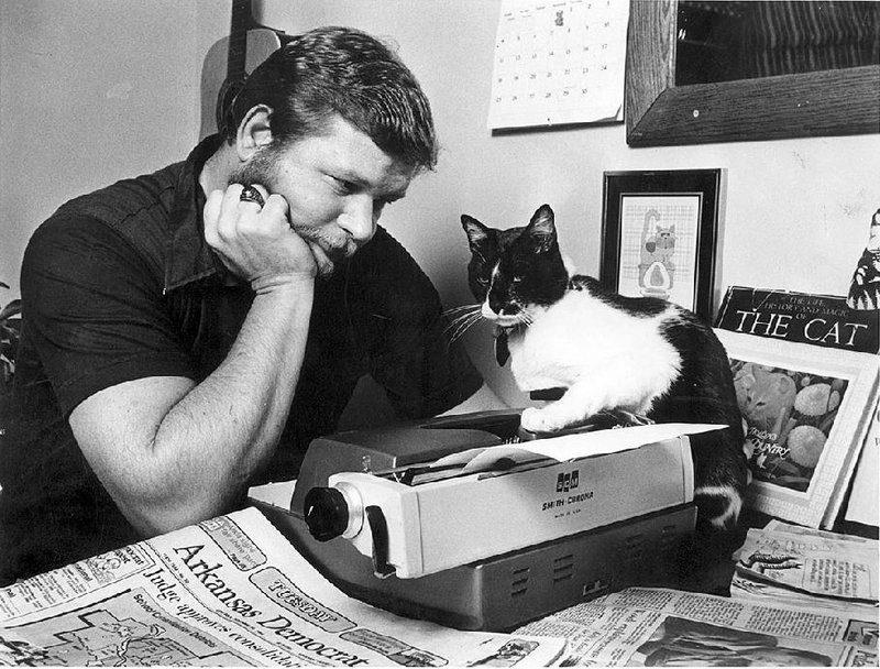 This rare 1984 photo shows Otus the Head Cat dictating his column to Owner. It was a weekly habit until Otus’ death in 1992. These days, he just emails it directly. Fayetteville-born Otus the Head Cat’s award-winning column of humorous fabrication appears every Saturday.

