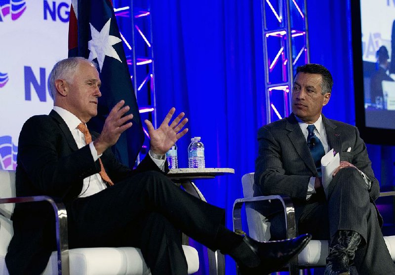 Australian Prime Minister Malcolm Turnbull (left) speaks Saturday with Gov. Brian Sandoval of Nevada, the chairman of the National Governors Association, during the group’s meeting in Washington. 