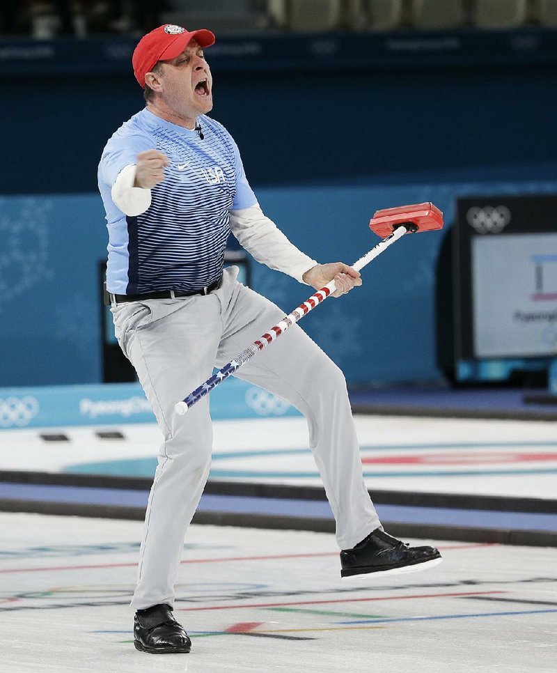 United States skip John Shuster reacts Saturday after making a shot during a 10-7 victory over Sweden to claim the gold medal at the Gangneung Curling Centre in Pyeongchang, South Korea. The Americans used a five-point
eighth end to pull away.
