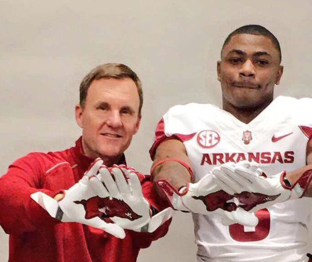 Arkansas Coach Chad Morris and receiver T.Q. Jackson are shown during Jackson's visit to Arkansas in February 2018. 