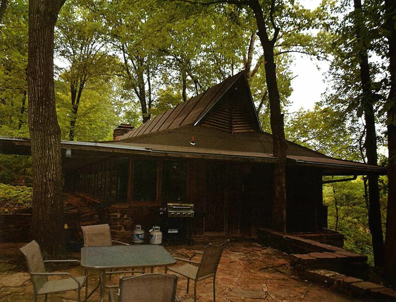 Courtesy Arkansas Historic Preservation Program Deepwood House at 4697 W. Finger Road in Fayetteville is seen nestling in the woods of Kessler Mountain. Late architect Herb Fowler and his family lived in the home, which could be considered for the National Register of Historic Places.