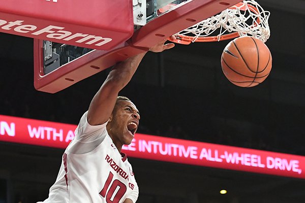 Arkansas' Daniel Gafford dunks against Colorado State Tuesday Dec. 5, 2017 at Bud Walton Arena in Fayetteville.