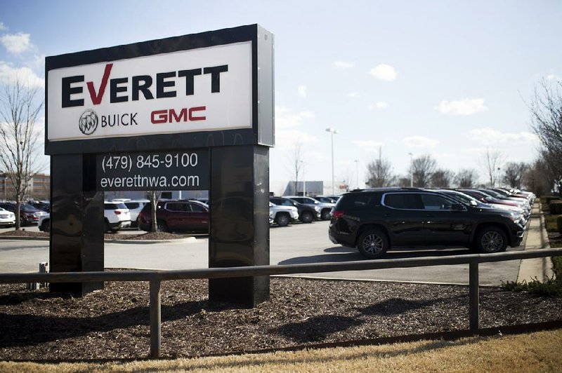 New cars fill the lot Monday at Everett Buick GMC in Bentonville. RML Automotive NWA closed on a deal Monday to purchase the dealership and Everett’s Chevrolet dealership and Dodge, Jeep, Ram and Fiat dealership, both in Springdale.