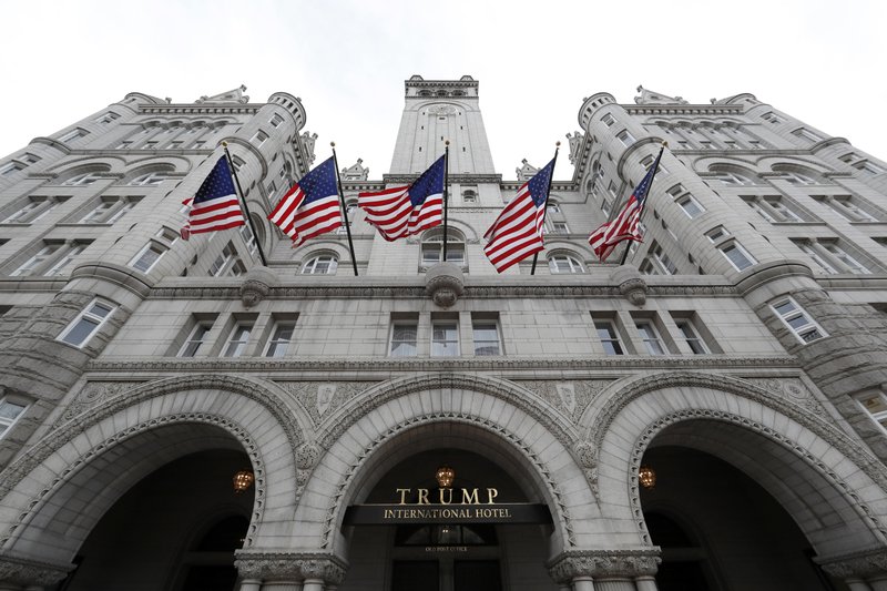 FILE - In this Dec. 21, 2016, file photo, the Trump International Hotel on Pennsylvania Avenue in Washington. A Trump Organization executive says the company has donated an undisclosed amount of profits from foreign government patrons at its hotel properties to the U.S. Treasury, but won't say how much. (AP Photo/Alex Brandon, File)