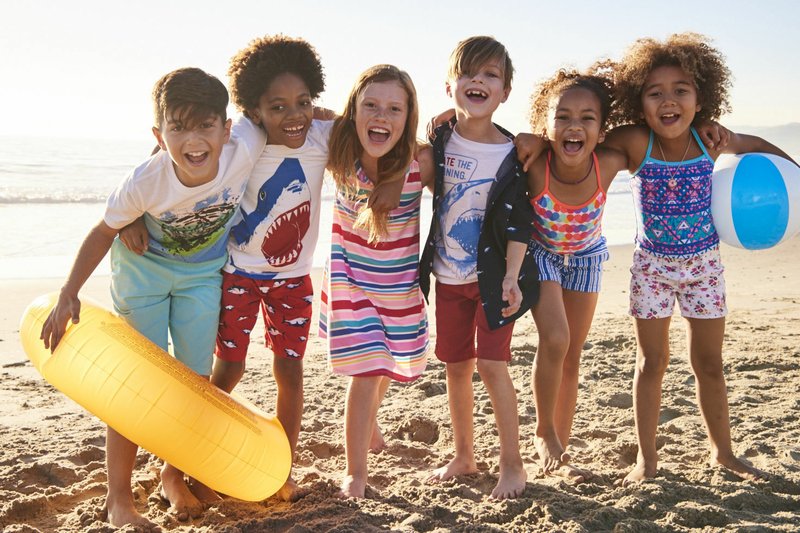 In this undated image provided by Walmart models pose for a photo wearing children’s clothing brand Wonder Nation. The world’s largest retailer is unveiling several new private label brands for women, men and children that will be exclusively available in stores and online, starting Thursday. (Walmart via AP)
