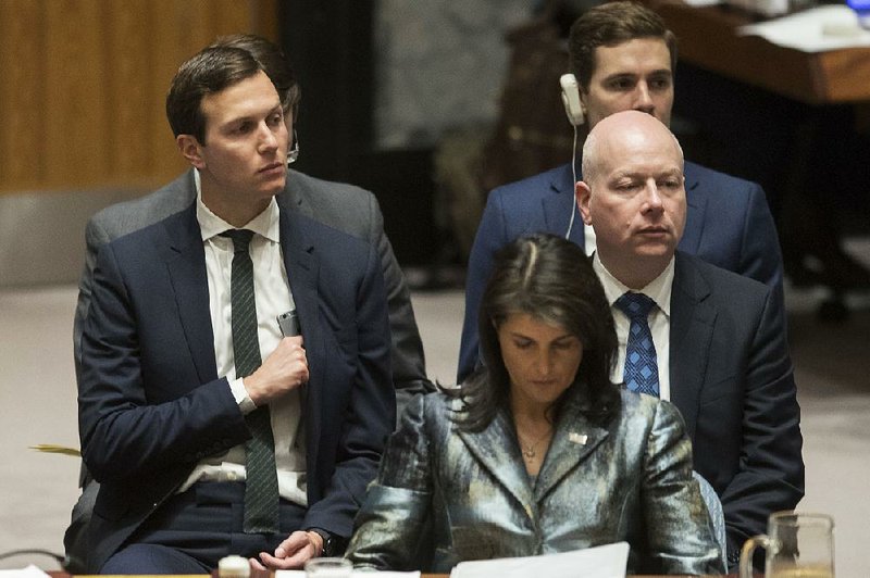 Jared Kushner, left, American Ambassador to the United Nations Nikki Haley, center, and Jason Greenblatt listen as  Israel's ambassador to the United Nations Danny Danon speaks during a Security Council meeting on the situation in Palestine, Tuesday, Feb. 20, 2018 at United Nations headquarters. 