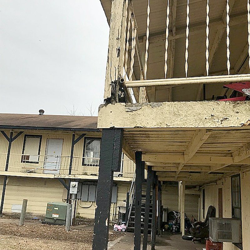 COURTESY PHOTO Lincoln City Council will consider a resolution to condemn this apartment complex at 119 N. Carter St., for numerous violations of fire prevention, building, electrical and fuel gas codes, and violations of the city's property maintenance code.