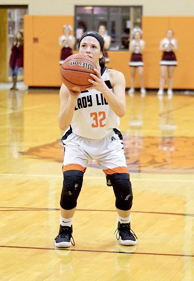 Westside Eagle Observer File Photo/RANDY MOLL Gabbi Curtis, a Gravette sophomore, gets ready to shoot from the free-throw line earlier in the season at a Gravette home game.