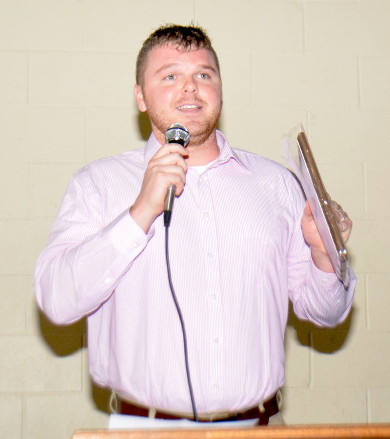 Mike Capshaw/Herald-Leader Brandon Thurman speaks to the crowd after being named the 2017 Chet Hobart Volunteer of the Year during an awards banquet at the Boys &amp; Girls Clubs of Western Benton County's Siloam Springs location on Thursday, Feb. 22. For more banquet pictures, see Page 6A.