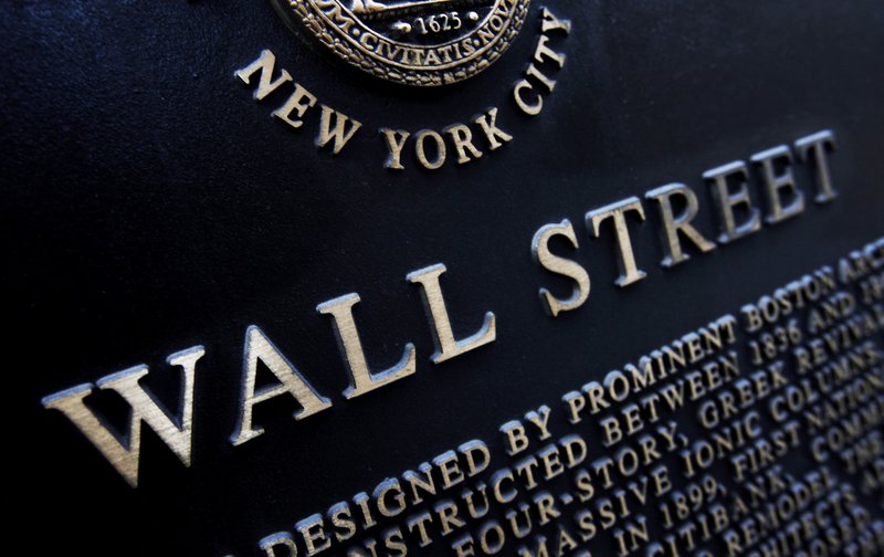 FILE - This Jan. 4, 2010, file photo shows an historic marker on Wall Street in New York. (AP Photo/Mark Lennihan, File)