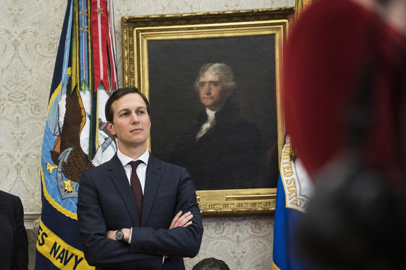 White House adviser Jared Kushner watches as President Trump signs an executive order in the Oval Office at the White House on Jan. 9. MUST CREDIT: Washington Post photo by Jabin Botsford