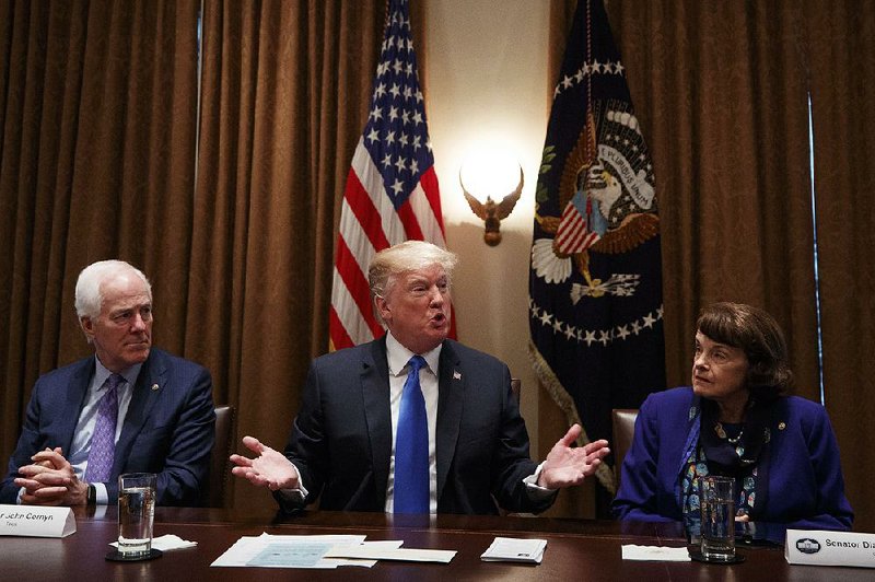 “We can’t wait and play games and nothing gets done,” President Donald Trump said Wednesday at the start of a White House meeting on gun violence where he was joined by House and Senate leaders, including Sens. John Cornyn (left), R-Texas, and Dianne Feinstein, D-Calif. 