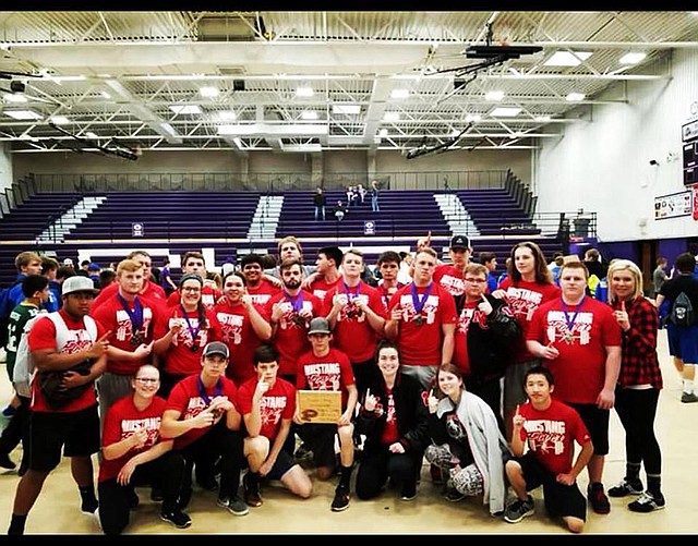 RICK PECK/SPECIAL TO MCDONALD COUNTY PRESS The McDonald County High School powerlifting team won the Pittsburg High School Powerlifting Meet held Feb. 24 in Pittsburg, Kan.