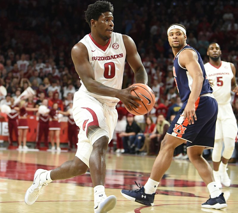 Special to The Sentinel-Record/Craven Whitlow SENIOR NIGHT: Arkansas senior guard Jaylen Barford powers to the goal Tuesday during the Razorbacks' 91-82 victory at Bud Walton Arena against the No. 14 Auburn Tigers. Barford scored 20 points and had 10 rebounds in his final home game for for the Hogs.