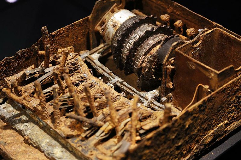 An “Enigma” machine, destroyed by German troops in the field, is displayed at Spyscape in New York. Visitors to the new attraction in New York can learn about the elements of spying, its history and what kind of spy they could be.