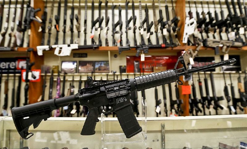 A Smith & Wesson M&P 15 Sport rifle, the company’s version of the AR-15, sits in a store in New Castle, Pa.