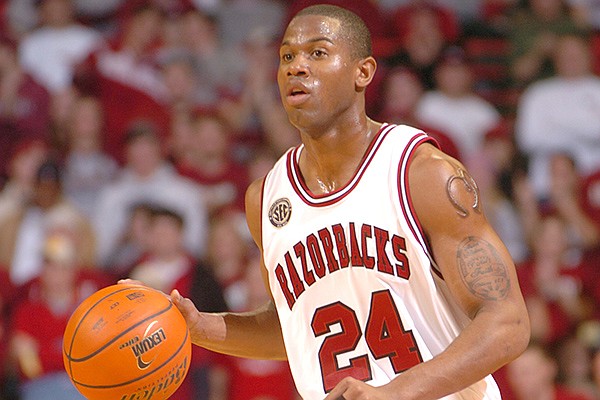 Arkansas senior guard Jonathon Modica brings the ball up the floor during the Hogs' 85-81 overtime win over Florida on Feb. 18, 2006, in Bud Walton Arena.
