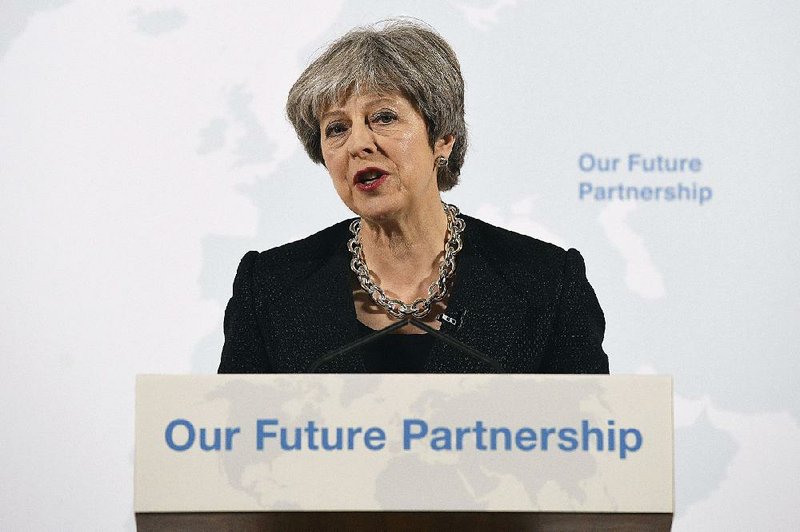 British Prime Minister Theresa May speaks Friday in London about trade with the European Union after Britain leaves the bloc. “In certain ways, our access to each other’s markets will be less than it is now,” she said. 
