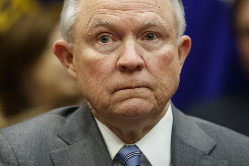 In this Feb. 22, 2018 photo, Attorney General Jeff Sessions listens during a meeting between President Donald Trump in the Roosevelt Room of the White House in Washington. (AP Photo/Evan Vucci)