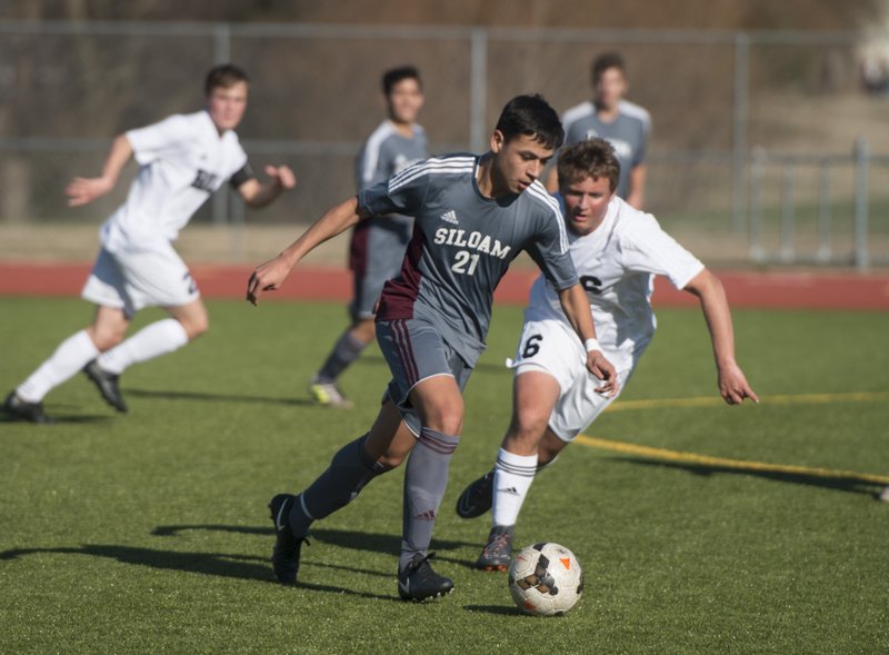 Bentonville vs Siloam Springs Friday, March 2, 2018, during the first round of the Northwest Arkansas Spring Soccer Classic tournament at the Tiger Athletic Complex in Bentonville.