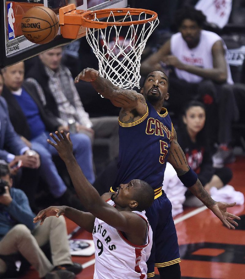 Cleveland Cavaliers guard J.R. Smith (top) is not offering any reasons as to why he threw a bowl of soup at assistant coach Damon Jones, earning him a one-game suspension.  

