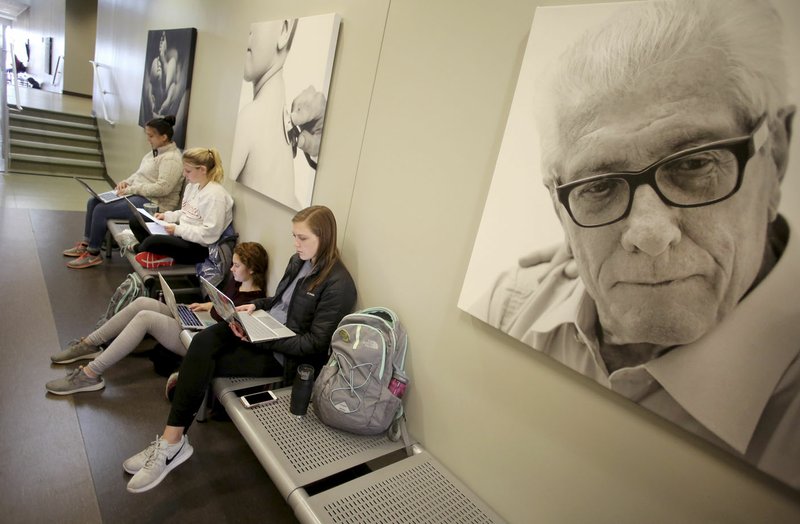 NWA Democrat-Gazette/DAVID GOTTSCHALK Catherine Beachner (right), a sophomore at the University of Arkansas, and student in the Eleanor Mann School of Nursing, studies with other students for a test in the hall of the Eppley Center of Health Professions on the campus in Fayetteville. A large demand for nurses continues to exist in Northwest Arkansas.