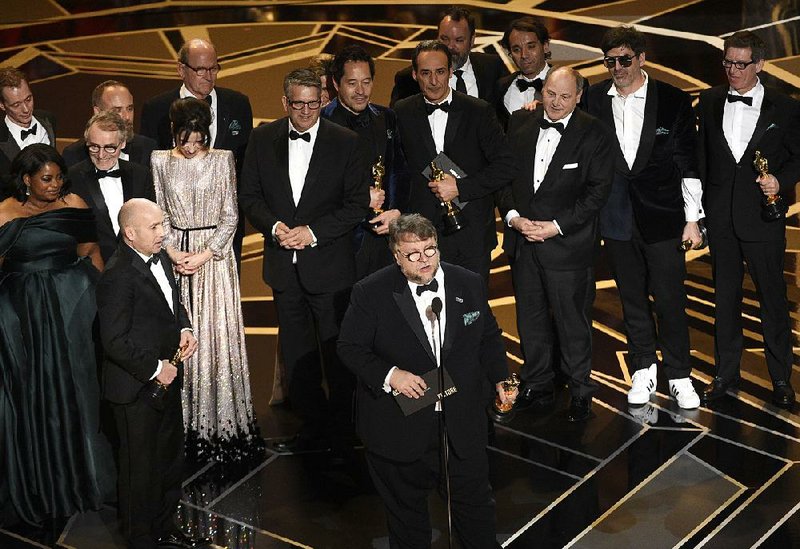 Guillermo del Toro and the cast and crew of The Shape of Water accept the award for best picture at the Oscars on Sunday at the Dolby Theatre in Los Angeles.