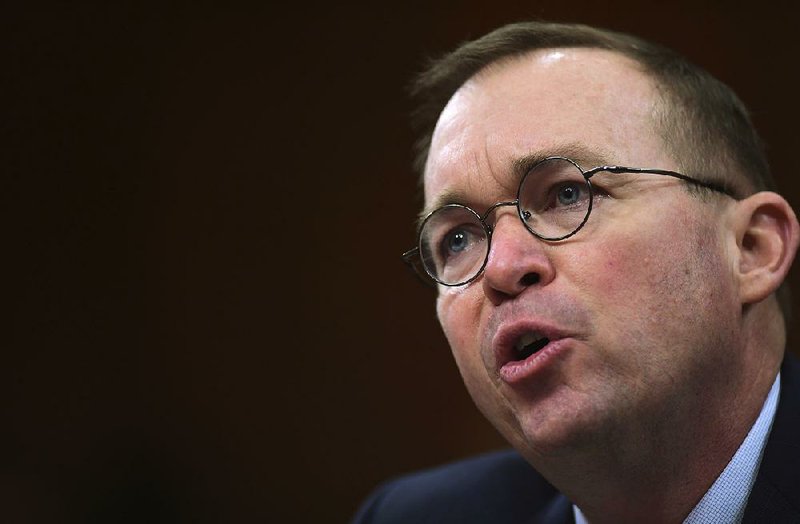In this Feb. 13, 2018, file photo, Budget Director Mick Mulvaney testifies before the Senate Budget Committee on Capitol Hill in Washington on President Donald Trump's fiscal year 2019 budget proposal. 