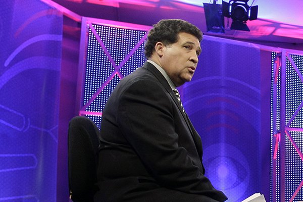 Greg Gumbel is shown prior to taping a television interview for the men's NCAA Final Four college basketball championship game Sunday, April 3, 2011, in Houston. (AP Photo/Eric Gay)

