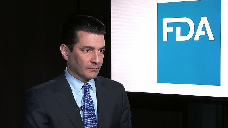 Food and Drug Administration Commissioner Scott Gottlieb listens during an interview with The Associated Press in New York on Monday, March 5, 2018. 