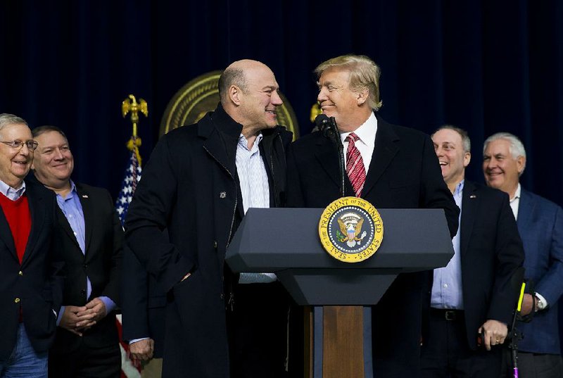 Gary Cohn, shown with President Donald Trump earlier this year at Camp David in Maryland, is the latest high-profile departure from the Trump administration. 