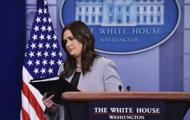 White House press secretary Sarah Huckabee Sanders ends a news conference Wednesday after telling reporters that in a reversal from earlier stated policy, exemptions to planned steel and aluminum tariffs would be made on a “case-by-case” and “country-by-country” basis. 