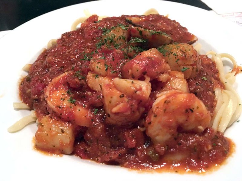 Linguine With Seafood includes plenty of shrimp, baby clams, bits of fish and small scallops. 
