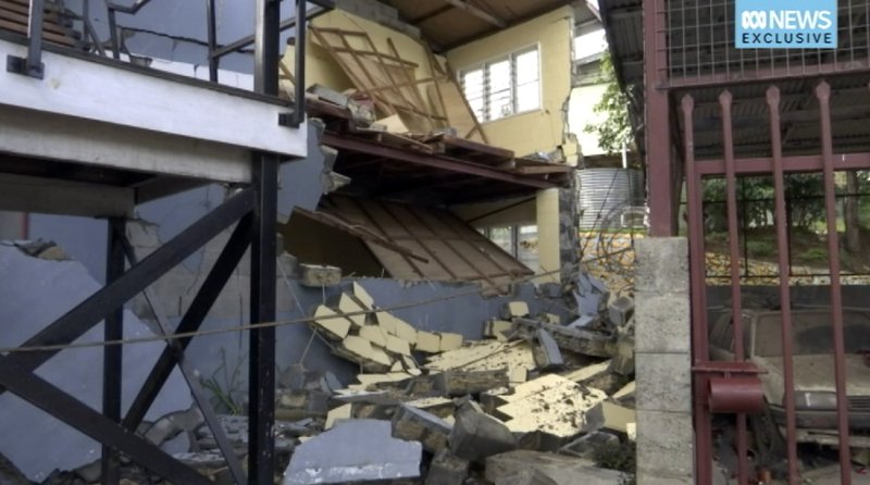 FILE - This file image made from video provided Feb. 28, 2018, show the damaged building following an earthquake in Mendi, Papua New Guinea. At least 55 people have been confirmed dead and authorities fear the toll could exceed 100 from last week's powerful earthquake in Papua New Guinea, as survivors faced more shaking early Wednesday,March 7, 2018 from the strongest aftershock so far. (Australia Broadcasting Corporation via AP, File)