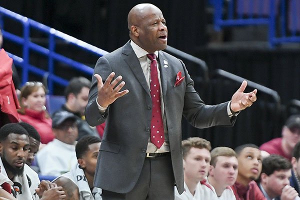 Arkansas coach Mike Anderson looks toward his players during a Southeastern Conference Tournament game against South Carolina on Thursday, March 8, 2018, in St. Louis. 