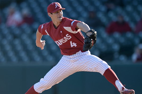 Arkansas reliever Bryce Bonnin delivers to the plate against Dayton Thursday, March 1, 2018, during the sixth inning at Baum Stadium in Fayetteville. 
