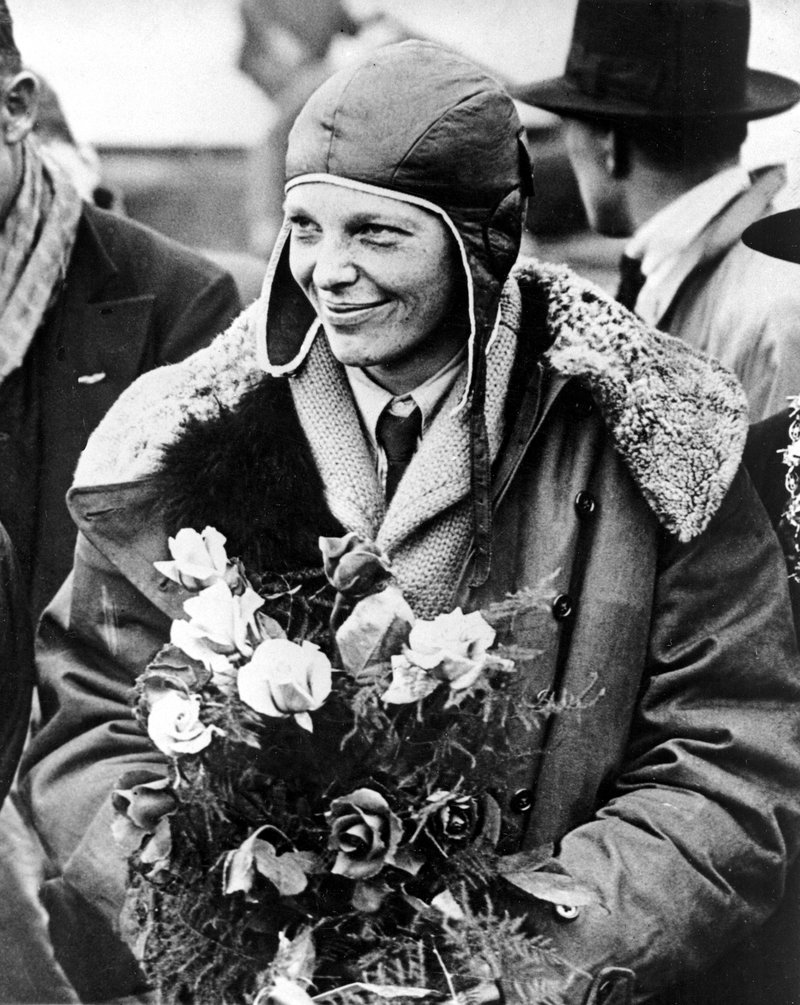 In a June 26, 1928 file photo, American aviatrix Amelia Earhart poses with flowers as she arrives in Southampton, England, after her transatlantic flight on the "Friendship" from Burry Point, Wales. Bones found in 1940 on a western Pacific Ocean island were quite likely to be remains from famed aviator Amelia Earhart, a new analysis concludes. Until somebody disproves the link, “the most convincing argument is that they are hers,” University of Tennessee anthropologist Richard Jantz said in a statement from the institution. 