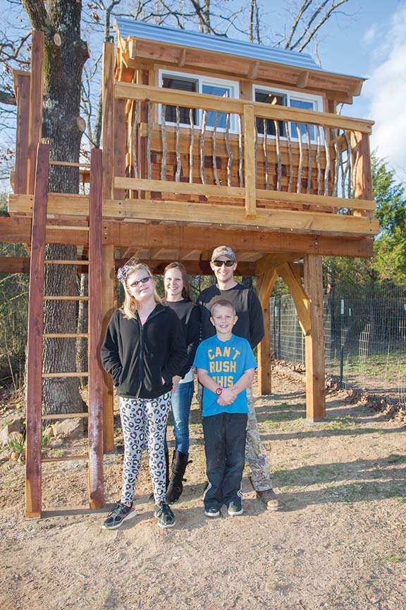 Allisa Carter, 11, of Searcy is a Make-A-Wish recipient of a treehouse. Carter, a Southwest Middle School student, has tuberous sclerosis complex, a rare genetic condition. Pictured are, front, from left, Alissa and her brother, Brandon, 8; and back, their parents, Ashley and Robert Carter.