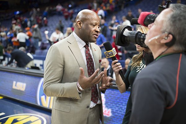 Arkansas coach Mike Anderson interviews with SEC Network following the Razorbacks' 80-72 win over Florida in the SEC Tournament on Friday, March 9, 2018, in St. Louis. 