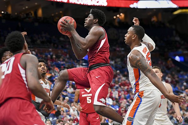 Arkansas' Jaylen Barford goes up for a shot during an SEC Tournament game against Florida on Friday, March 9, 2018, in St. Louis. 